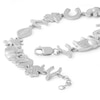 Thumbnail Image 1 of 1/10 CT. T.W. Diamond Luck Theme Charm Link Bracelet in Sterling Silver - 7.5"