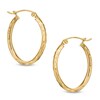 Thumbnail Image 0 of 25mm Diamond-Cut Oval Hoop Earrings in 10K Gold