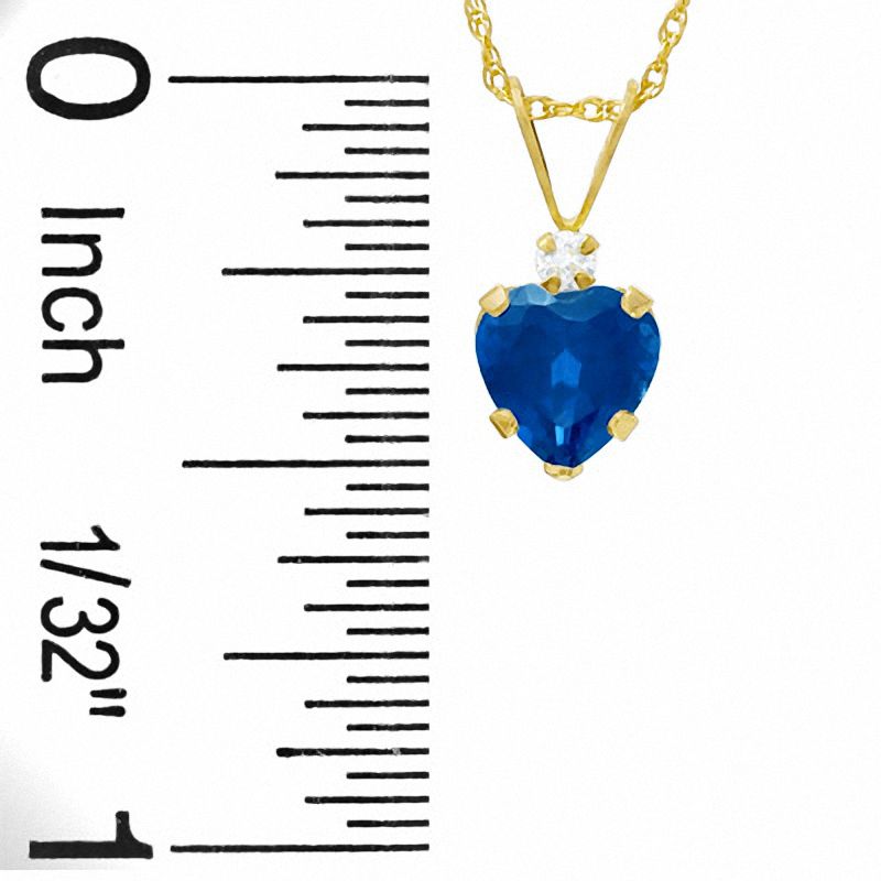 Main Image 2 of 6mm Heart-Shaped Lab-Created Sapphire Pendant in 10K Gold with CZ