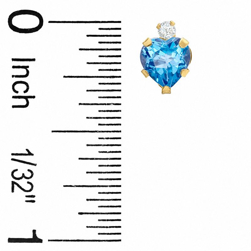 6mm Heart-Shaped Blue Topaz Stud Earrings in 10K Gold with CZ