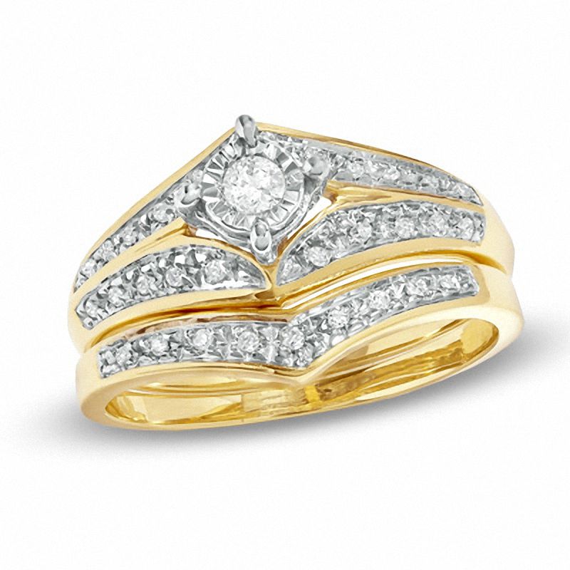 1/5 CT. T.W. Diamond Illusion Bridal Set in 10K Gold - Size 7