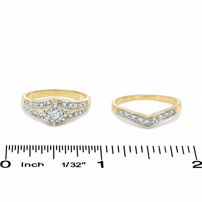 1/5 CT. T.W. Diamond Illusion Bridal Set in 10K Gold - Size 7