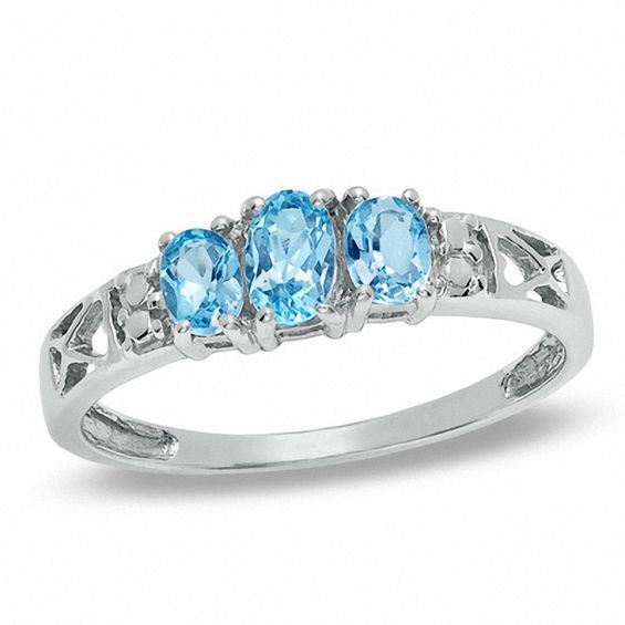 Oval Blue Topaz Three Stone Ring in 10K White Gold - Size 7