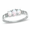 Thumbnail Image 0 of Oval Lab-Created Opal Three Stone Ring in 10K White Gold - Size 7