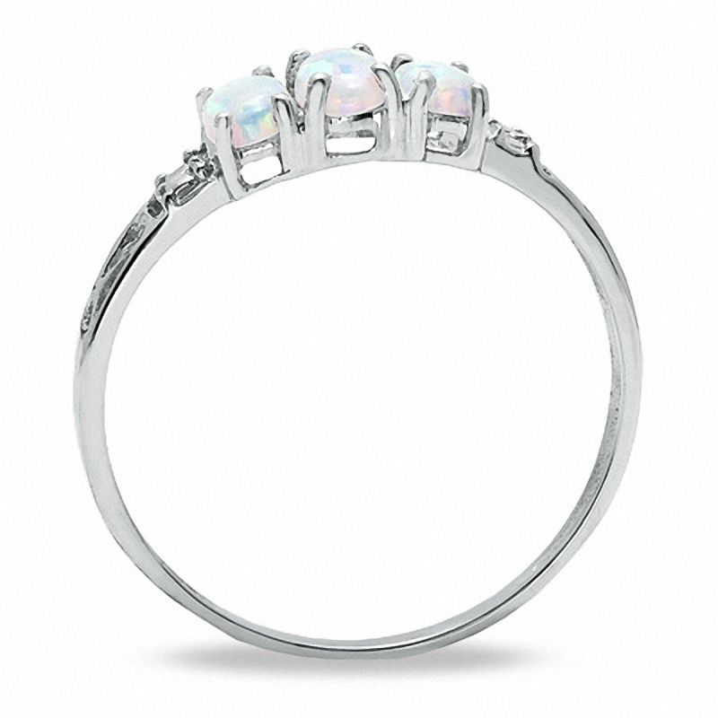 Oval Lab-Created Opal Three Stone Ring in 10K White Gold - Size 7