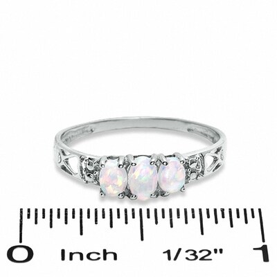 Oval Lab-Created Opal Three Stone Ring in 10K White Gold - Size 7