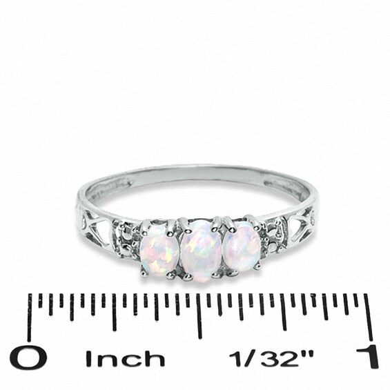 Oval Lab-Created Opal Three Stone Ring in 10K White Gold - Size 7