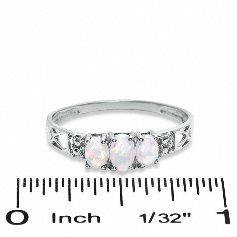 Oval Lab-Created Opal Three Stone Ring in 10K White Gold - Size 7
