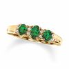 Thumbnail Image 1 of Oval Emerald Three Stone Ring in 10K Gold with Diamond Accents - Size 7