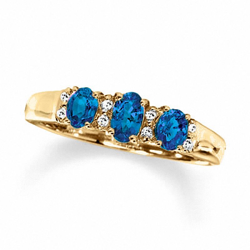 Oval Sapphire Three Stone Ring in 10K Gold with Diamond Accents - Size 7