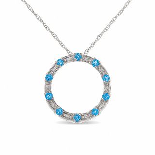 Blue Topaz Circle Pendant in 10K White Gold with Baguette Diamond Accents