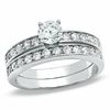 5mm Cubic Zirconia Solitaire Pavé Bridal Set in Sterling Silver - Size 7