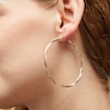 Thumbnail Image 2 of 59.5mm Diamond-Cut Twist Hoop Earrings in 10K Tube Hollow Gold