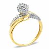 1/10 CT. T.W. Diamond Marquise Cluster Ring in 10K Gold - Size 7