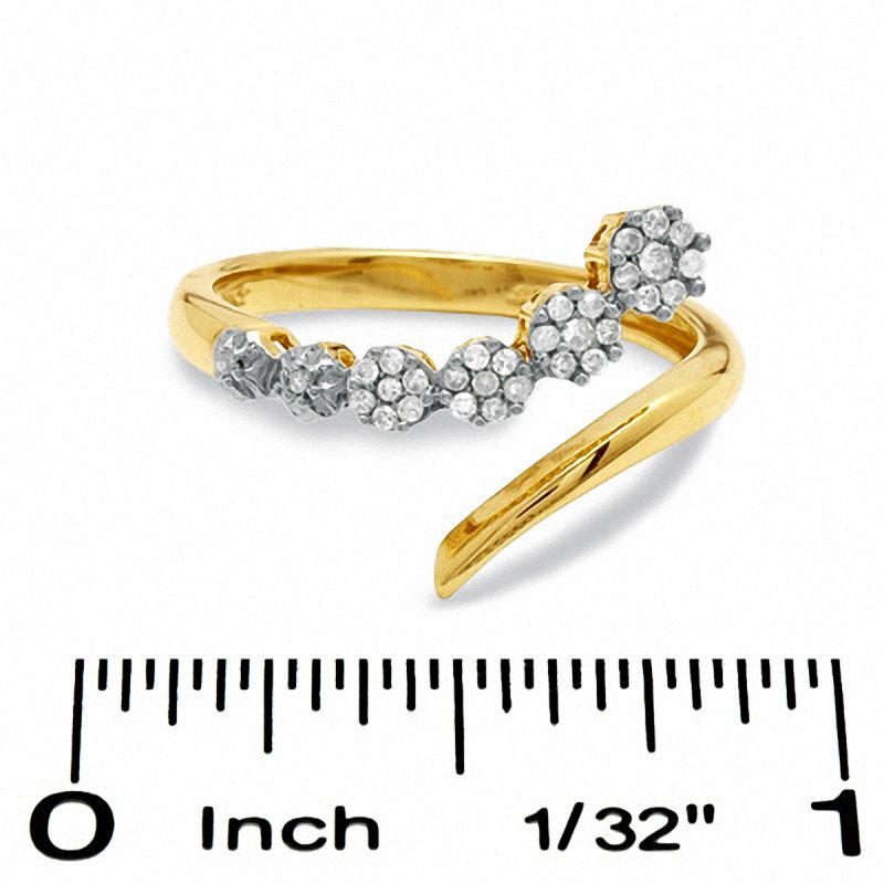 1/10 CT. T.W. Journey Diamond Seven Stone Bypass Ring in 10K Gold