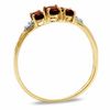 Thumbnail Image 2 of Oval Garnet Three Stone Ring in 10K Gold - Size 7