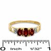 Thumbnail Image 3 of Oval Garnet Three Stone Ring in 10K Gold - Size 7