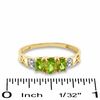 Thumbnail Image 3 of Oval Peridot Three Stone Ring in 10K Gold - Size 7