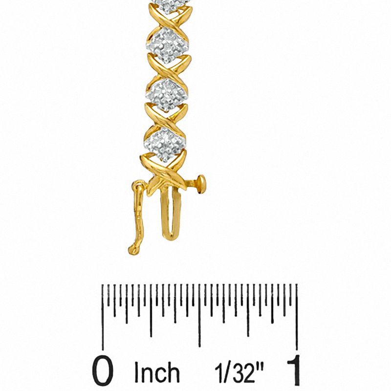 1/10 CT. T.W. Diamond Cluster X Bracelet in 18K Gold-Plated Sterling Silver - 7.25"