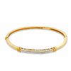 1/10 CT. T.W. Diamond Bangle in 18K Gold-Plated Sterling Silver - 7.5"