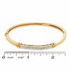 1/10 CT. T.W. Diamond Bangle in 18K Gold-Plated Sterling Silver - 7.5"