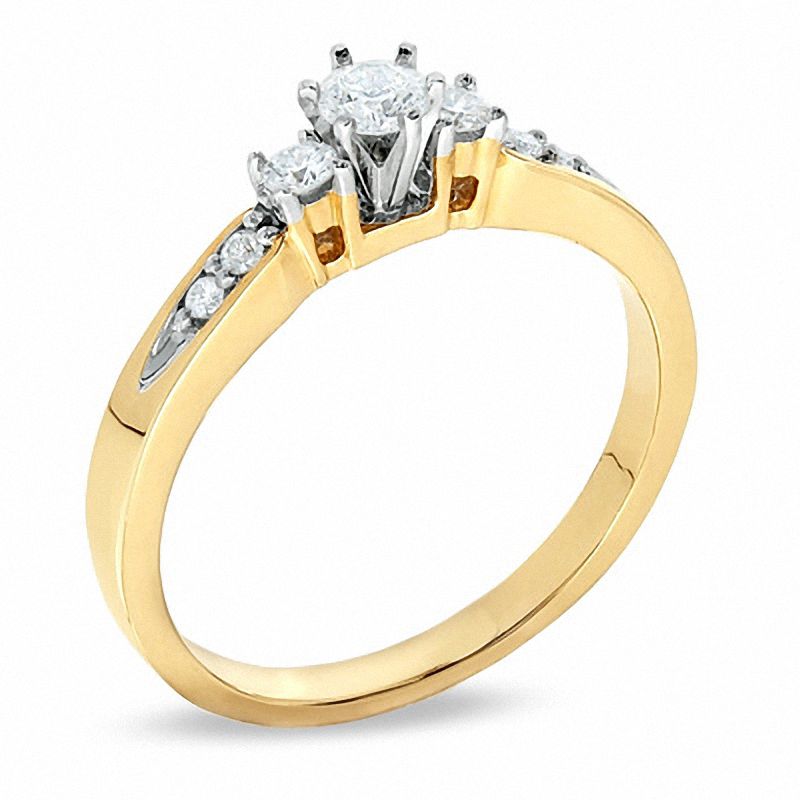 1/3 CT. T.W. Diamond Three Stone Promise Ring in 10K Gold - Size 7