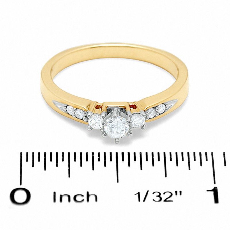 1/3 CT. T.W. Diamond Three Stone Promise Ring in 10K Gold - Size 7