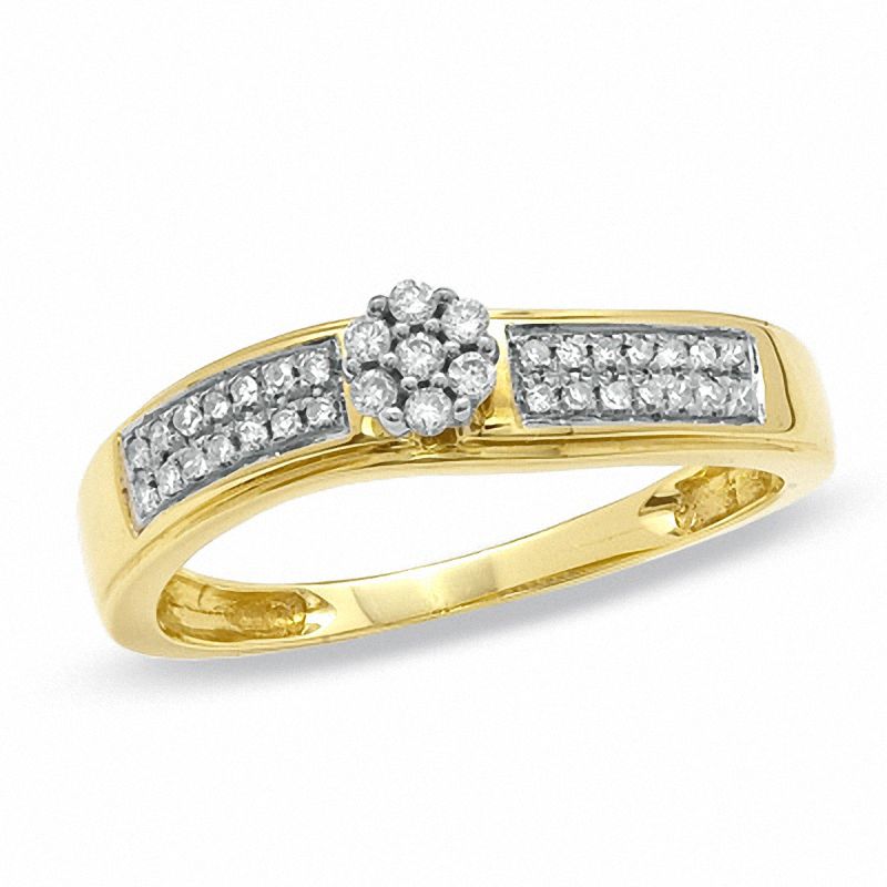1/6 CT. T.W. Diamond Seven Stone Wave Ring in 10K Gold - Size 7