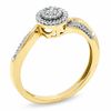 1/7 CT. T.W. Diamond Cluster Bypass Engagement Ring in 10K Gold - Size 7