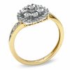 1/10 CT. T.W. Diamond Circle Cluster Ring in 10K Gold - Size 7