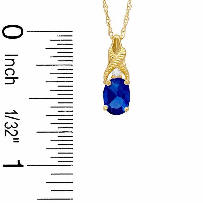 Oval Simulated Sapphire and CZ Pendant in Sterling Silver with 14K Gold Plate