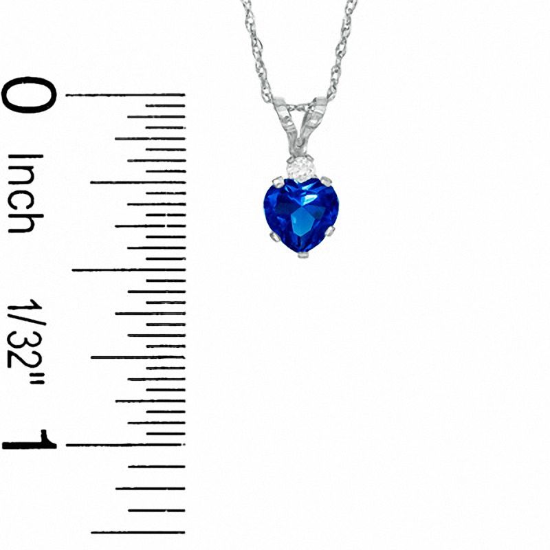 Heart-Shaped Simulated Sapphire Pendant and Stud Earrings Set in Sterling Silver with CZ
