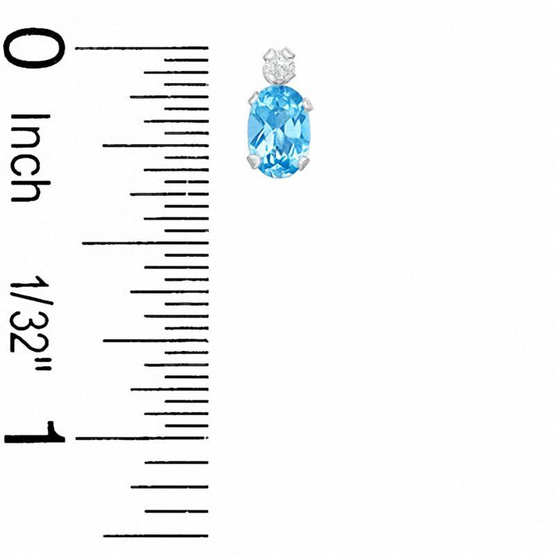 Main Image 3 of Oval Simulated Blue Topaz Pendant and Stud Earrings Set in Sterling Silver with CZ