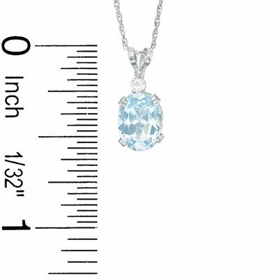 Oval Simulated Aquamarine Pendant and Earrings Set in Sterling Silver with CZ