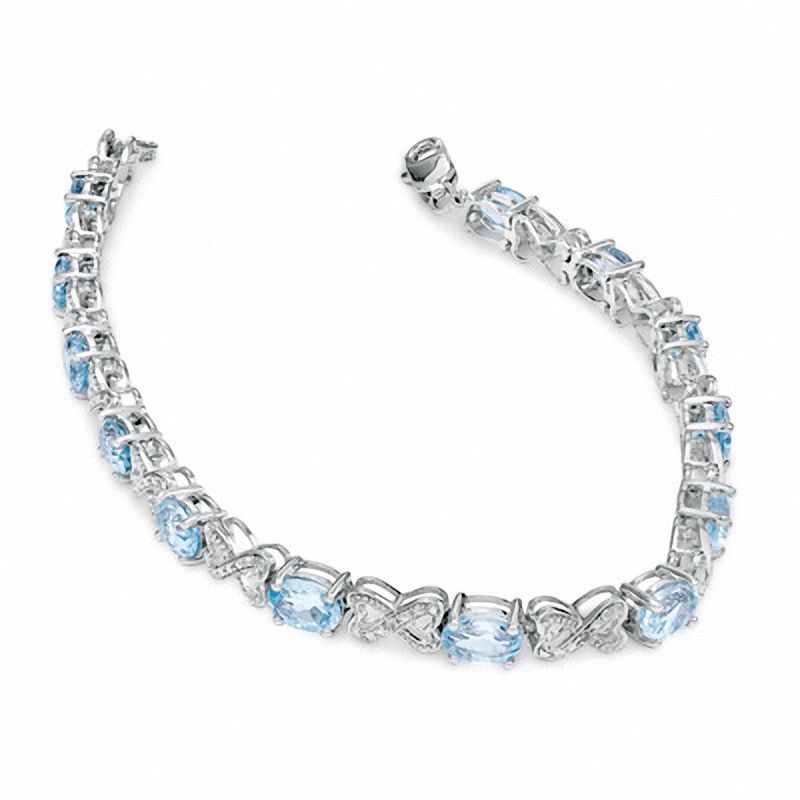 Oval Blue Topaz and Diamond Bracelet in Sterling Silver - 7.25"