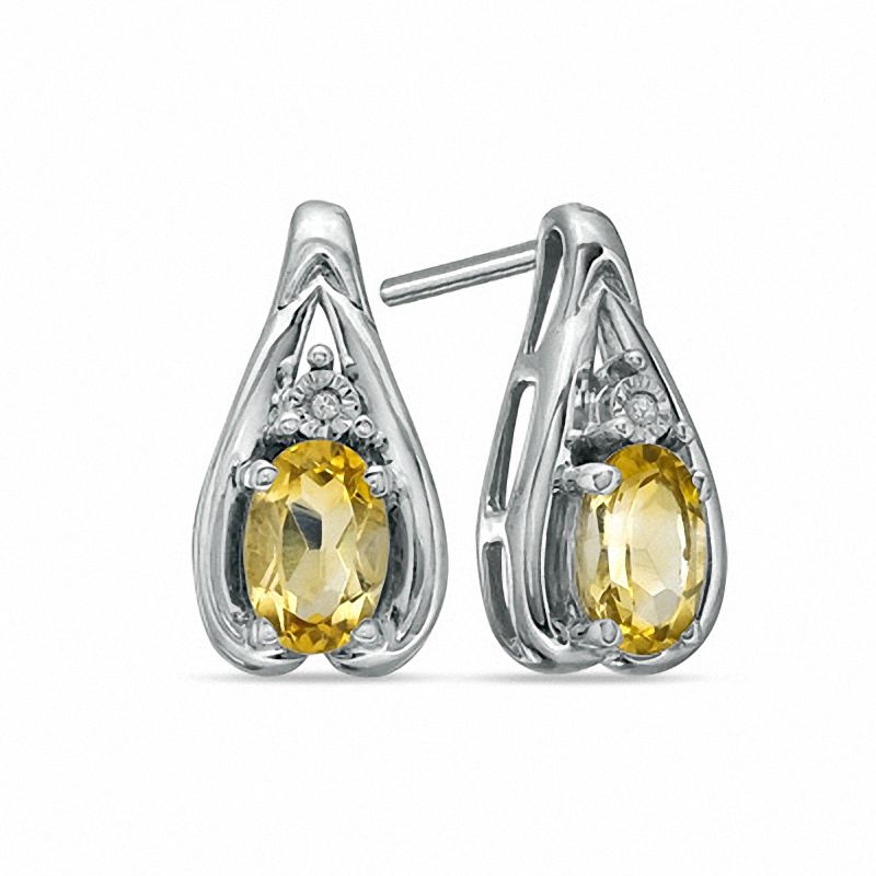 Oval Citrine and Diamond Accent Earrings in Sterling Silver