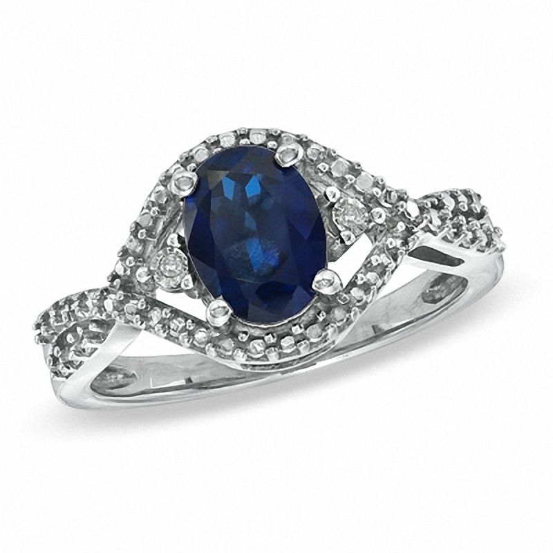 Main Image 1 of Oval Lab-Created Sapphire and Diamond Accent Ring in Sterling Silver - Size 7