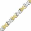 Thumbnail Image 0 of Crystal Accent Slant Stampato Bracelet in 10K Tri-Tone Gold Bonded Sterling Silver - 7.25"