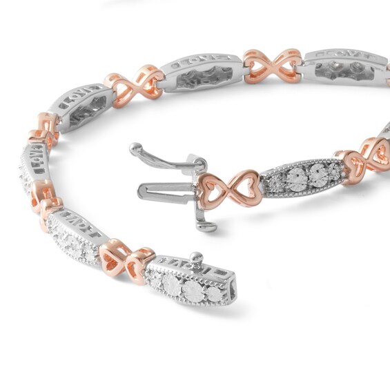 Solid Sterling Silver and 10K Plated Rose Gold 1/20 CT. T.W. Diamond Heart Bows Link Bracelet - 7.25"