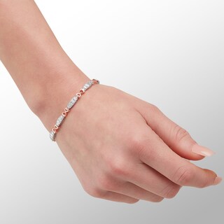 Solid Sterling Silver and 10K Plated Rose Gold 1/20 CT. T.W. Diamond Heart Bows Link Bracelet - 7.25"