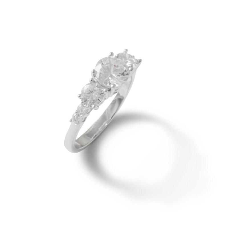 Cubic Zirconia Three Stone Ring in Sterling Silver - Size 5