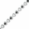 Thumbnail Image 1 of Black and White Cubic Zirconia Alternating Heart Link Bracelet in Sterling Silver - 7.25&quot;