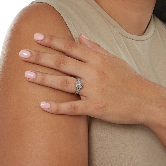 1/5 CT. T.W. Composite Diamond and Pink Sapphire Accent Double Frame Promise Ring in Sterling Silver