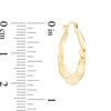 Thumbnail Image 1 of 21 x 23mm Twist Hoop Earrings in 10K Stamp Hollow Gold