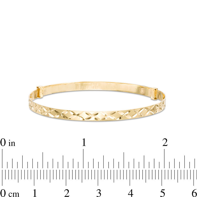 Child's Adjustable 3mm Diamond-Cut Bangle in 10K Gold - 7"