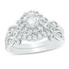 Thumbnail Image 0 of 5.5mm Cubic Zirconia Frame Scroll Bridal Set in Sterling Silver - Size 7