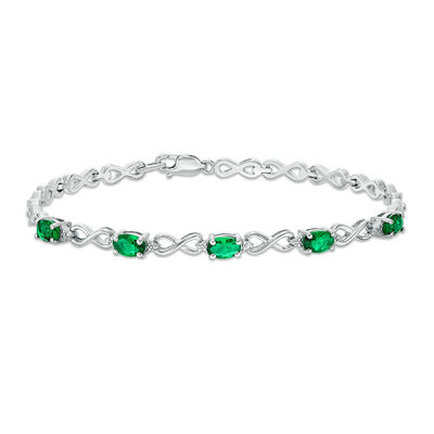Oval Simulated Emerald and Diamond Accent Infinity Link Bracelet in Sterling Silver - 7.25"