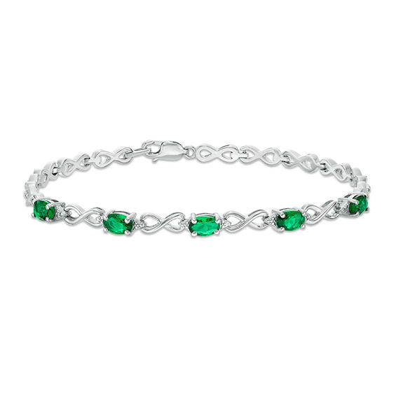 Oval Simulated Emerald and Diamond Accent Infinity Link Bracelet in Sterling Silver - 7.25"