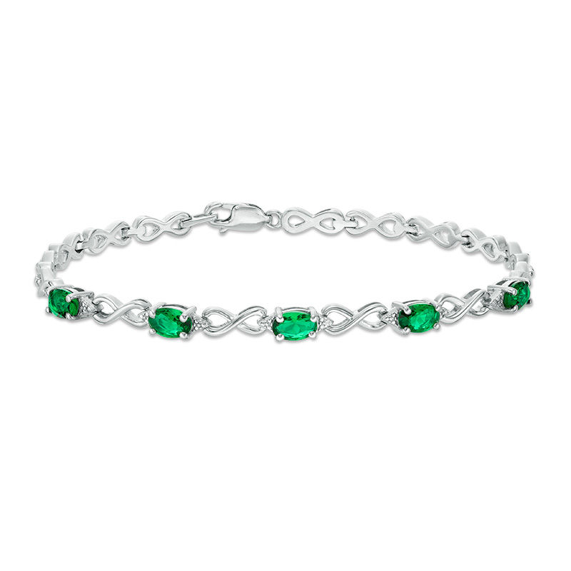 Main Image 1 of Oval Simulated Emerald and Diamond Accent Infinity Link Bracelet in Sterling Silver - 7.25"