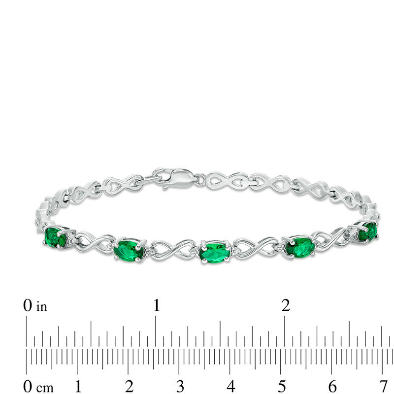 Main Image 2 of Oval Simulated Emerald and Diamond Accent Infinity Link Bracelet in Sterling Silver - 7.25"
